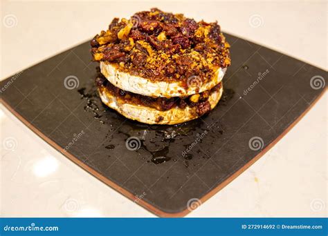 Baked Brie with Nuts stock photo. Image of dripping - 272914692