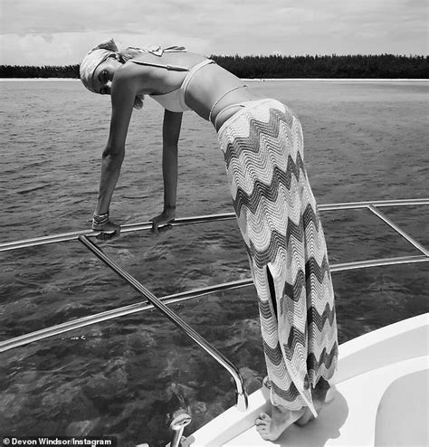 Devon Windsor Flashes The Flesh In A Skimpy White Bikini And Blue