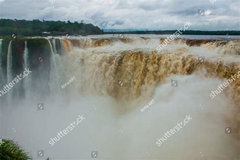 Tourists Visiting The Devil S Throat Waterfall In The Iguazu Falls One