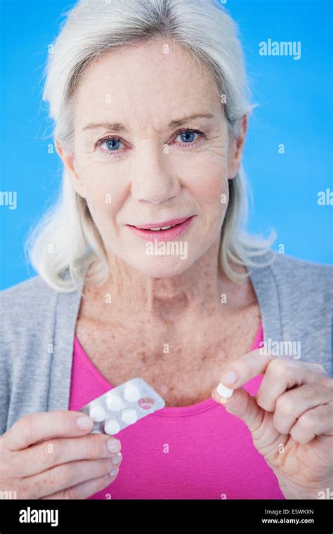 Elderly Person Taking Medication Stock Photo Alamy