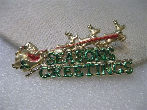 Vintage Gold Tone Seasons Greetings Christmas Brooch Santa Sleigh