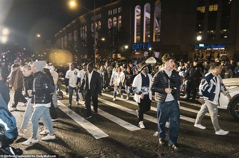 New York Yankees Fans Pour On To The Streets To Celebrate First Win In