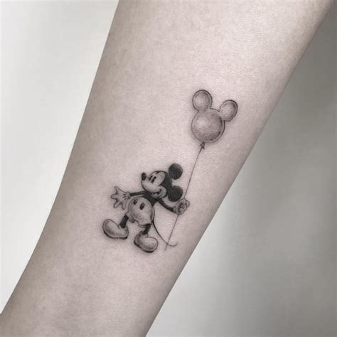 Janet Jackson Tattoos Mickey Mouse