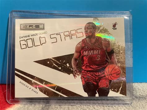 2009 10 Panini Rookies And Stars Gold Stars Holofoil 1 Dwyane Wade