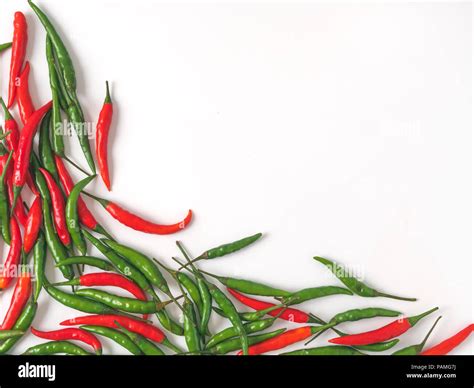 Creative Layout Chilli Peppers Background Of Red And Green Hot Pepper Isolated On White Copy