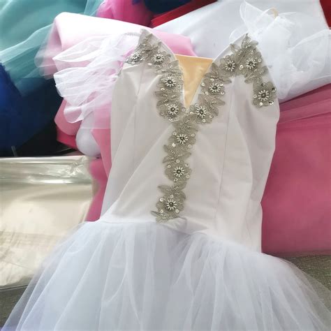 gold and white dance costumes 6