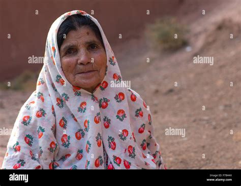 Portrait Of An Iranian Woman Wearing Traditional Floreal Chador In