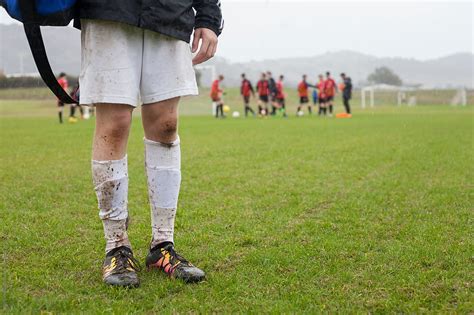 Muddy Football Player By Stocksy Contributor Skye Torossian Stocksy