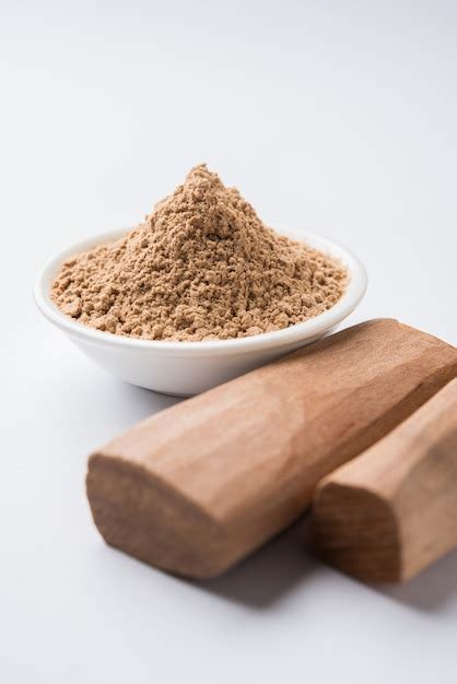 Premium Photo Chandan Or Sandalwood Powder With Stocks And