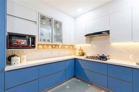 Blue And White Spacious Kitchen Design Livspace