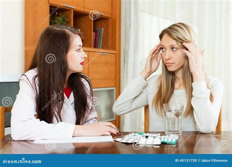 Doctor Prescribing Medication To Adult Woman Stock Photo Image Of