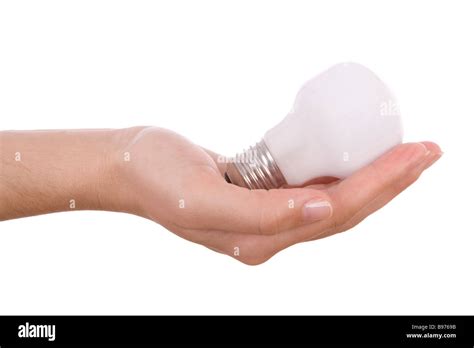 Hand Holding An Incandescent Light Bulb Isolated On White Stock Photo