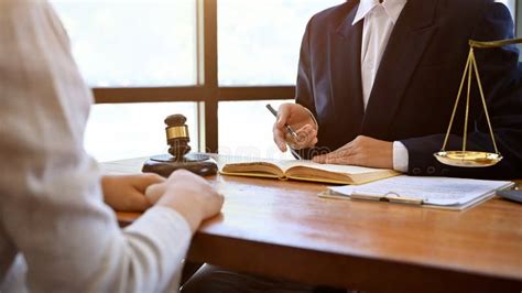 A Successful Male Lawyer Is Giving Advice And Consulting To His Client