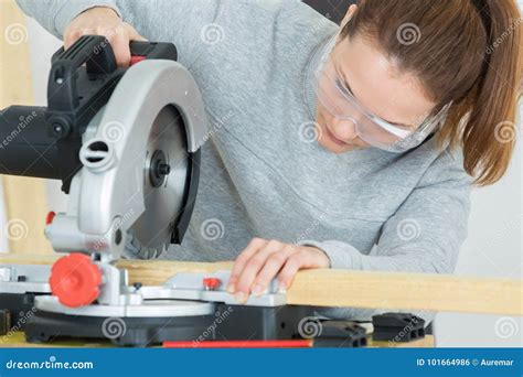 Female Carpenter Using Circular Saw Stock Photo Image Of Sawmill