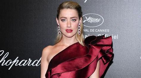 Amber Heard All Smiles As She Appears At Taormina Film Festival In Italy