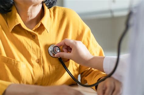 Premium Photo Doctor Using A Stethoscope Checking Patient Stethoscope