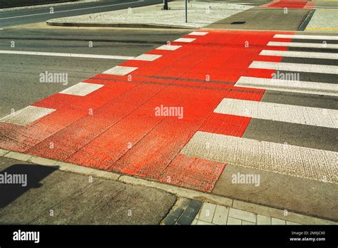 Red Bike Lane Next To Pedestrian Crossing Stock Photo Alamy