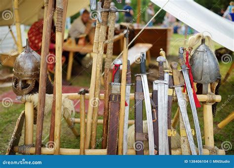 Toy Medieval Armour Helmets And Wooden Weapons Sold On Market Stall