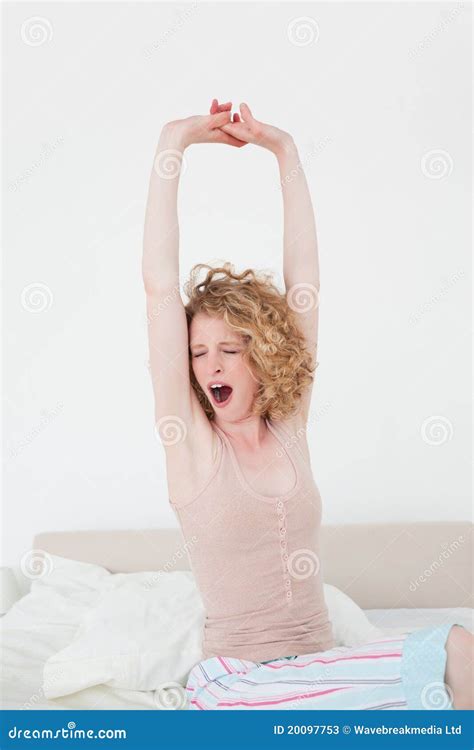 Beautiful Blonde Female Stretching In Her Bedroom Stock Image Image