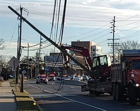 An Excavator Pulls Down Power Lines Causing Power Outages In Toms River