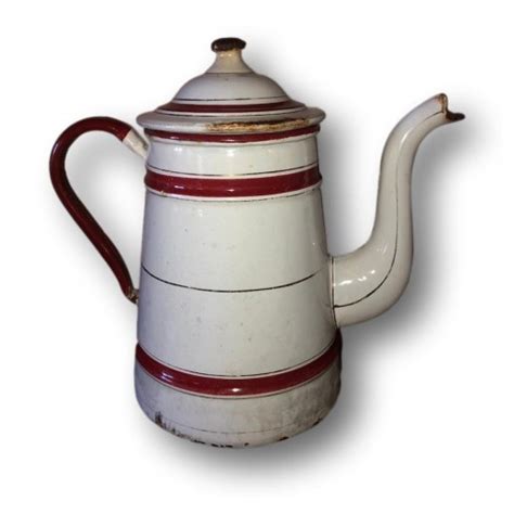 Ancienne cafetière en tôle émaillée blanche et rouge