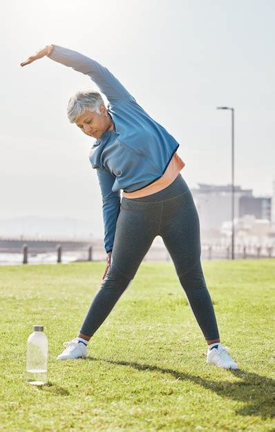 Premium Photo Senior Woman Stretching And Exercise In Park With