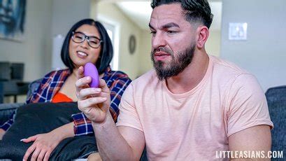 Horny Asian Girl Emerald Love Bounces On A Rock Hard Dong Photos