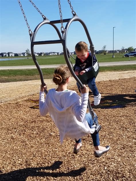 This Swing Is Designed So That The Kid And The Parent Can Swing