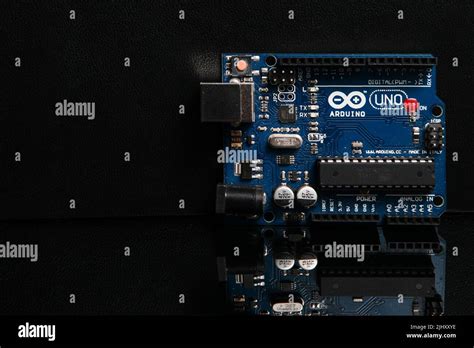 Arduino Uno Board On Black Background Stock Photo Alamy