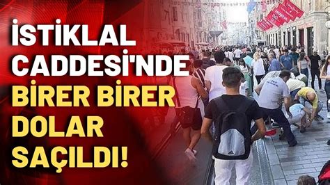 İstiklal Caddesi nde maske takıp dolar saçtılar Yakalamaya çalışanlar