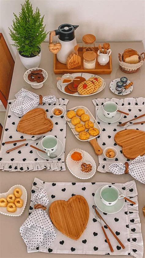 A Table Set Up With Plates Bowls And Utensils For Breakfast Or Brunch