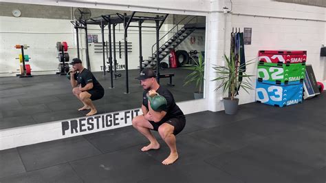 Kettlebell Single Arm Front Rack Squat Youtube