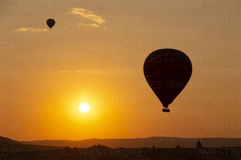 Balloons In The Sunset