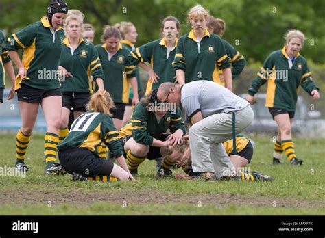 Girl With Broken Nose In Rugby Game Being Cared For Stock Photo Alamy