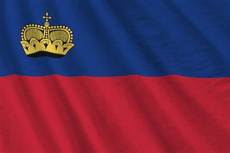 Premium Photo Liechtenstein Flag With Big Folds Waving Close Up Under