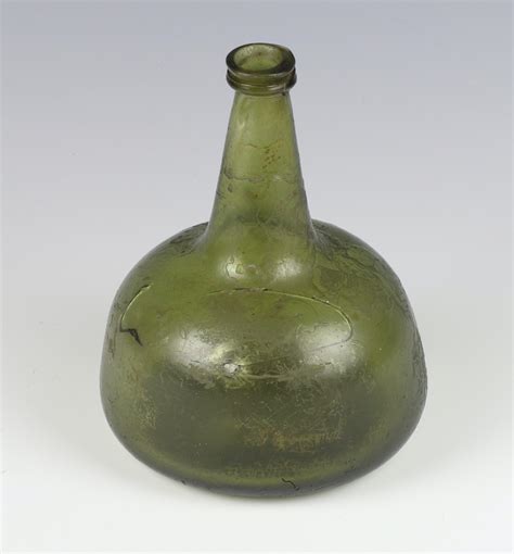 An 18th Century Green Glass Wine Bottle Of Mallet Form 14th December