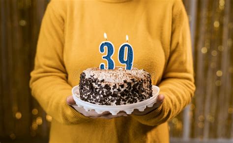 Woman Holding A Delicious Cake With Number 39 Candles While Celebrating Birthday Party Birthday