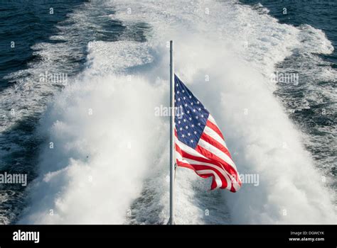 American Flag In Front Of A Boats Wake Near Bar Harbor Maine New