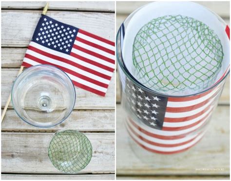 An American Flag Is On The Table Next To A Wine Glass With A Straw In It