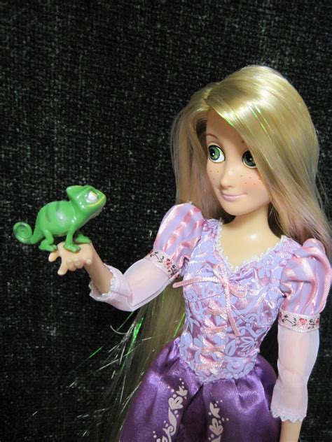 Never Grow Up A Mom S Guide To Dolls And More Disney Store Tangled Dolls