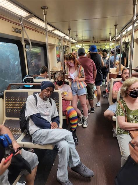 Many People Are Sitting On The Subway Train