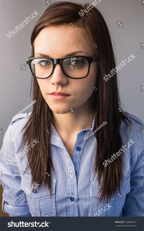 Serious Pretty Brunette Wearing Glasses Posing Stock Photo Shutterstock