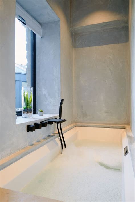 Textured Concrete Bathroom With Sunken Bathtub The Hideout Perfect