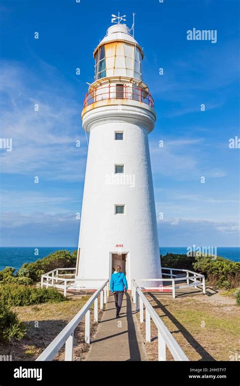 Australia, Victoria, Cape Otway, Female tourist visiting Cape Otway ...