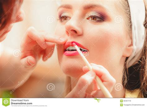 Make Up Artist Applying Lipstick With Brush Stock Image Image Of