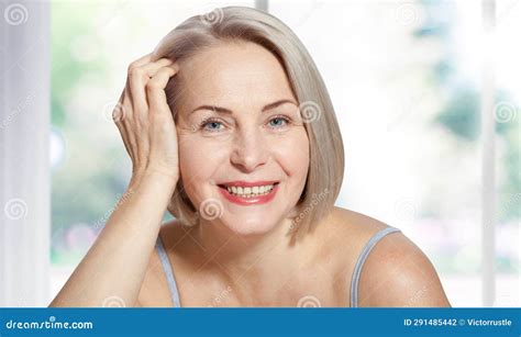 Happy Beautiful Middle Aged Blonde Woman Shows Off Her Perfectly Well