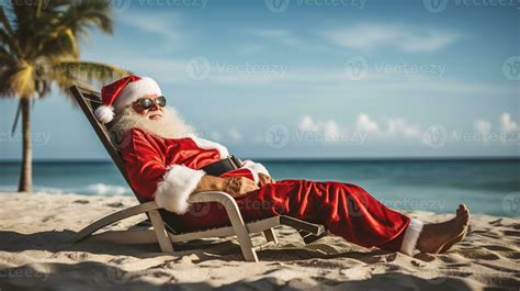 Santa Claus relaxing on tropical beach. He is lying on a sunlounger ...