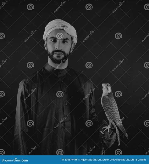 Young Falconer Holding A Bird Of Prey Stock Photo Image Of Hawk