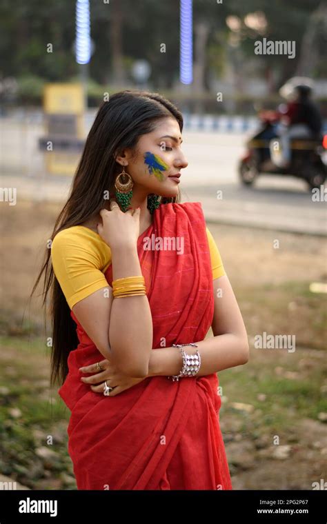 Portrait Of A Pretty Young Indian Woman Wearing Traditional Saree And