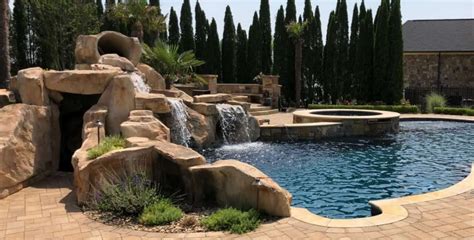 Custom Artificial Rock Grottos And Waterfalls In Backyard Paradise